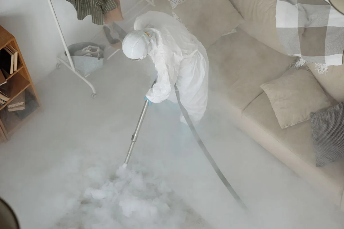 Biohazard cleanup technician in protective equipment, Lincoln Beach, OR